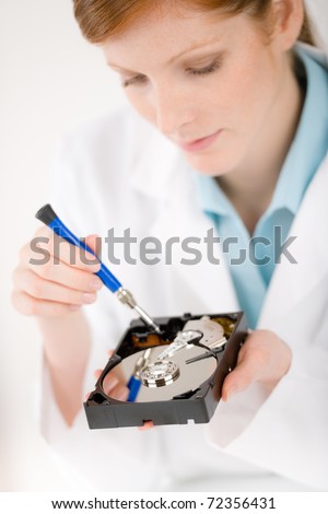 Female computer engineer - IT woman repair <b>hard disc</b> defect - stock-photo-female-computer-engineer-it-woman-repair-hard-disc-defect-72356431