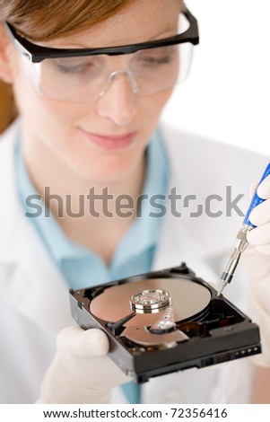 Female computer engineer - IT woman repair hard disc defect