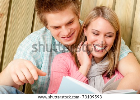 Couple in love - summer portrait with book together