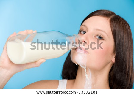 Healthy lifestyle - portrait of woman drink milk for breakfast