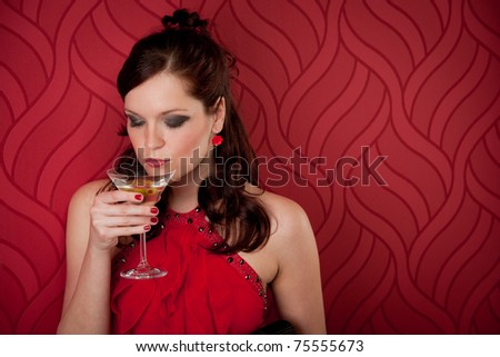 Cocktail party woman evening dress enjoy drink on red background