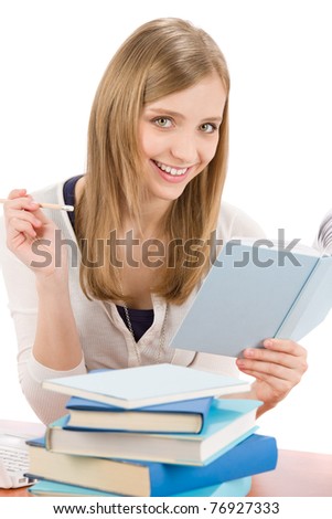 Student teenager happy woman write homework with book