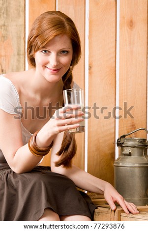 Young woman drink healthy natural home-made milk country