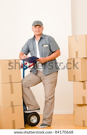 Messenger mature male courier delivering parcel boxes. Shipping and logistics.