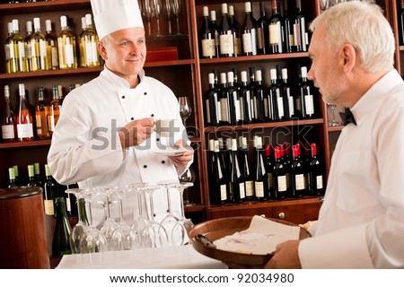 Chef cook drink coffee waiter serve on tray in restaurant