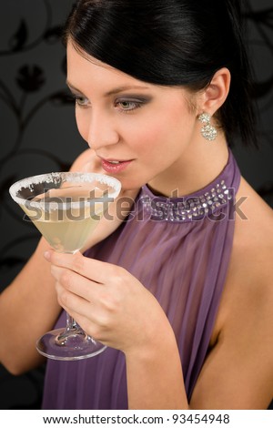 Woman party dress drink cocktail glass smiling look aside