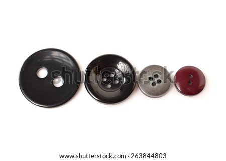 Screws and wall plugs on black background
