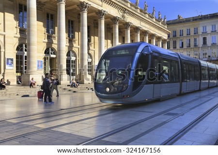 BORDEAUX, FRANCE- October 1 2015:  Tram is passing by (Grand theatre) Grand ThÃ©Ã¢tre de Bordeaux in France.