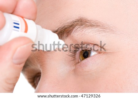 man sick with eye drops