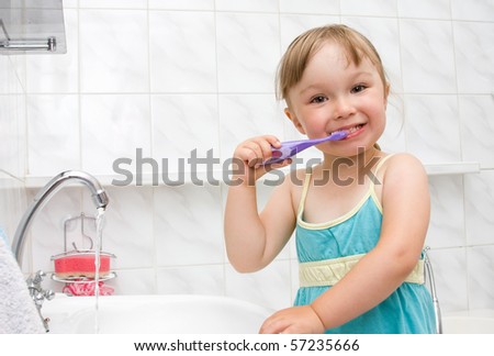 stock photo happy little girl in toilet