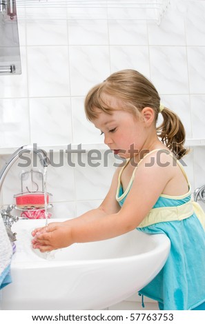 stock photo happy little girl in toilet