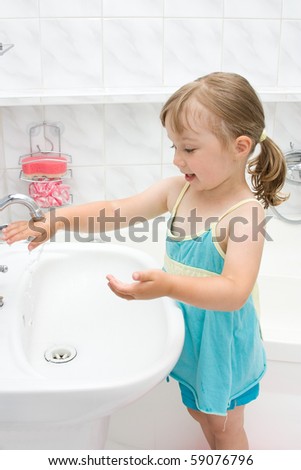 stock photo happy little girl in toilet