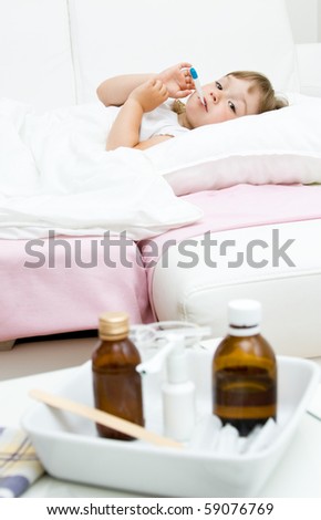 sick little girl  on bed