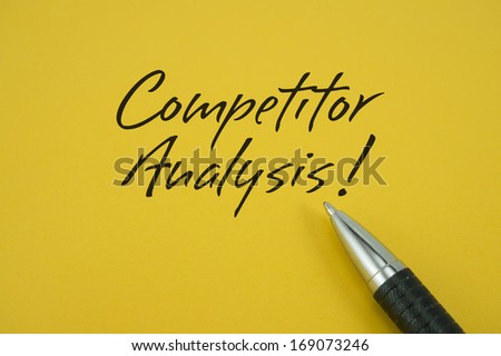 Competitor Analysis note with pen on yellow background