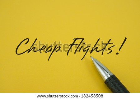 Cheap Flights! note with pen on yellow background