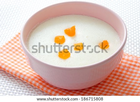Semolina with fruits.Bowl of milk creamy sweet porridge.