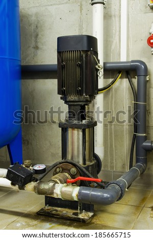 Water pipes in the boiler room and electric motors