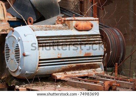 Old electric motor with belt drive