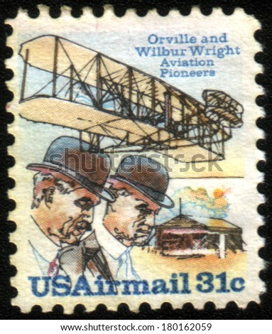 USA - CIRCA 1978: A stamp printed in USA issued for the 75th Anniversary of First Powered Flight showing Wright brothers and Wright Flyer I plane, circa 1978.