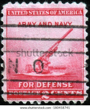 USA - CIRCA 1940: Postage stamp printed in the USA, National Defense Issue, shows a 90-millimeter Antiaircraft Gun, circa 1940
