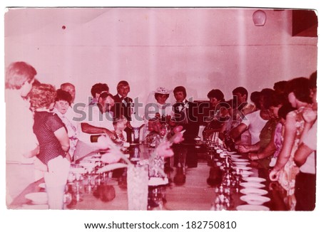 USSR, Petrapavlovsk  - CIRCA 1980s: An antique photo shows wedding feast