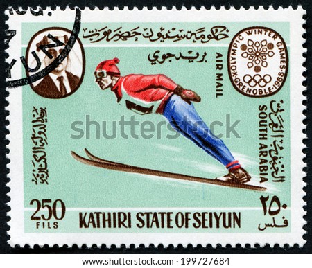 SOUTH ARABIA - CIRCA 1968: A stamp printed in South Arabia in Kathiri state in Hadhramaut shows Olympic Games in Grenoble , circa 1968
