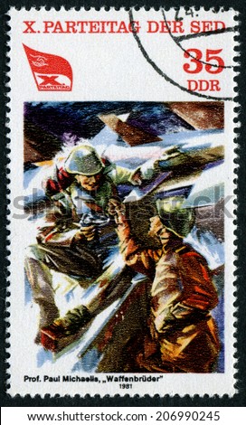 GERMANY - CIRCA 1981: stamp printed by Germany, shows shows painting Brotherhood in Arms by Paul Michaelis, 10th Communist Party Congress ( Paintings), circa 1981.