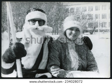 USSR - CIRCA 1980s: An antique photo shows Santa Claus and Snow Maiden