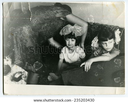Ussr - CIRCA 1970s: An antique Black & White photo shows Mom with young children