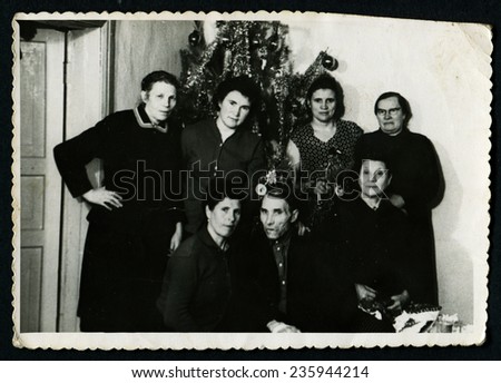 Ussr - CIRCA 1970s: An antique Black & White photo shows Family Christmas Photo