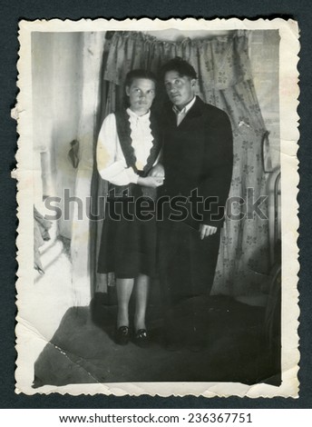 USSR - CIRCA 1950s: An antique photo shows man and wife, USSR, circa 1950s