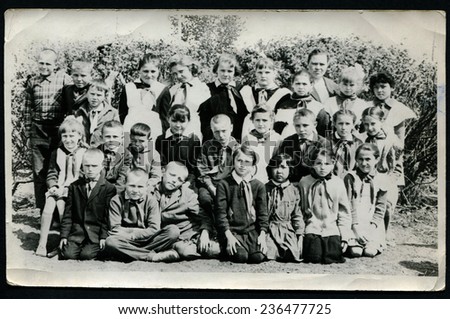 Ussr - CIRCA 1980s: An antique Black & White photo show Group portrait of a schoolchildren