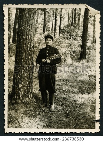 Ussr - CIRCA 1970s: An antique Black & White show old man standing in the woods