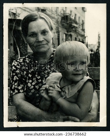 Ussr - CIRCA 1980s: An antique Black & White photo show mother and daughter