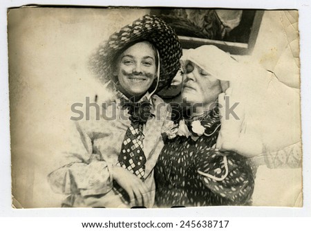 Ussr - CIRCA 1970s: An antique Black & White photo show man and woman in fancy dress