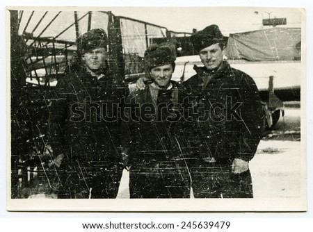 USSR - CIRCA 1960s: An antique photo shows three friends