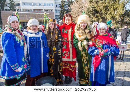 PETROPAVLOVSK, KAZAKHSTAN - MARCH 21, 2015: celebration of the new year on the solar calendar astronomical in Iranian and Turkic peoples. Women in international dresses