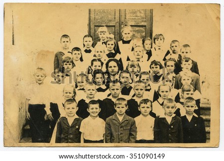 Ussr - CIRCA 1950: An antique Black & White photo show group of schoolchildren