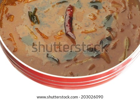 Sambar - Spicy Lentils from South India-Top view of Sambar from south India. Sambar is made of tuvar dal cooked with vegetables, tamarind water and fresh Indian spices.