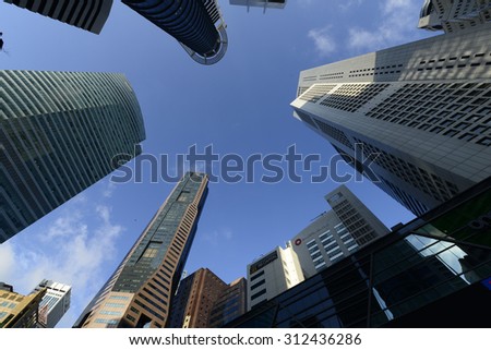 Singapore - July 25, 2015: Low angle view of Banks and Commercial buildings in Central Business District, Singapore.