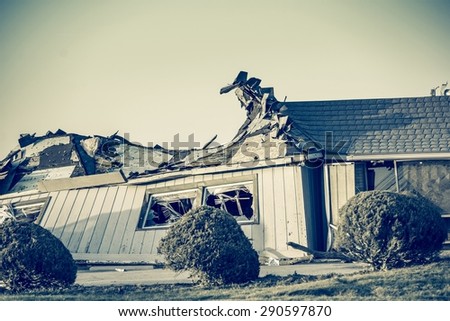 The Aftermath of a Tornado. Completely Destroyed Building. Closeup Photo.