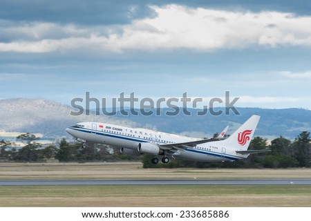 HOBART, TASMANIA/AUSTRALIA, OCTOBER 18TH: Image of a Air China passenger airliner with President Xi Jinping taking off from Hobart Airport on 18th October, 2014 in Hobart