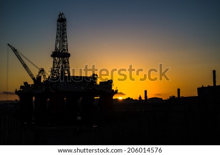 sunset on the oil rig