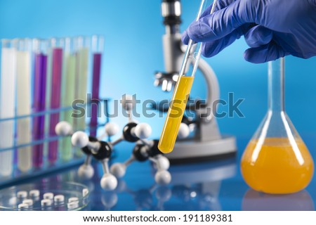 Workplace modern laboratory for molecular biology test on blue background