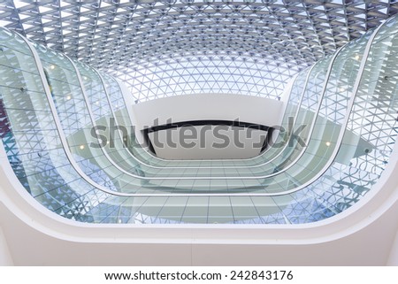 Looking up from the lobby inside a modern building