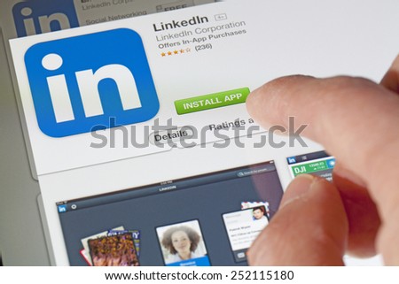 Adelaide, Australia - August 18, 2013: Installing the Linkedin app on an ipad. LinkedIn is a social networking website for people in professional occupations