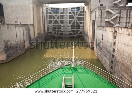 Ship entering the first lock of Three Gorges Dam in Yangtze river, China