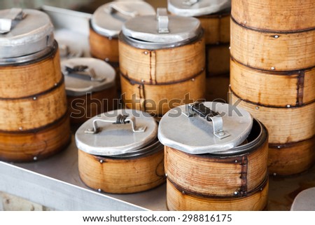 Close-up view of stacks of bamboo Dim Sum steamers