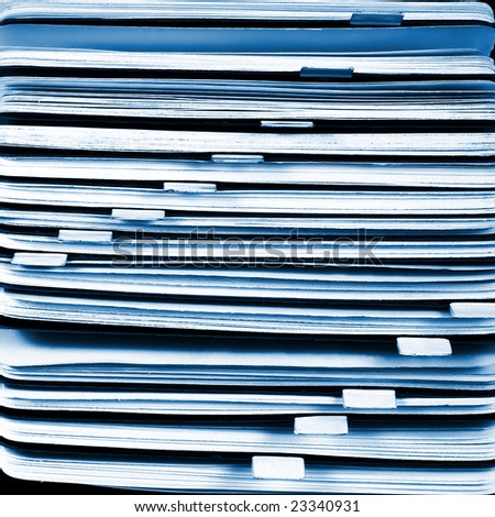 White & blue file in a filing cabinet. Rotary card background