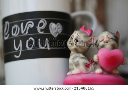 coffee mug inscription love heart chocolate cocoa beans figurine kittens heart